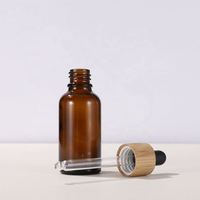 Bouteilles d'huile essentielle en verre ambré rond écologiques vides de 5 ml à 100 ml avec bouchon compte-gouttes en bambou, échantillons gratuits, MOQ 50