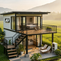 Maison mobile en acier personnalisable avec balcon vitré et escalier extérieur