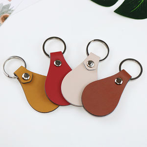 هدايا إبداعية رائجة لعام 2025، سلسلة مفاتيح مخصصة من الجلد الصناعي مع شعار بارز للرجال، هدايا ترويجية - Product Image 4