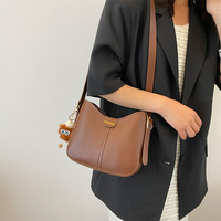 Sac seau pour femme en cuir PU de haute qualité, nouveau sac à bandoulière uni à grande capacité, sac à main en polyester pour femme
