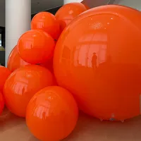 Esfera Inflable Naranja Mate Vibrante, Esfera Gigante de PVC para Instalaciones de Arte Moderno y Exhibiciones Comerciales Creativas en Escaparates