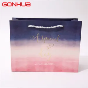 GONHUA Custom Logo Gold Foil Recyclable Printed Gift Paper Bag Retail Cloth Jewelry Kraft Packaging Shopping Bag With Handle
