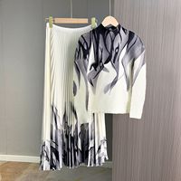 Ensemble plissé 2 pièces style Miyake personnalisé pour femme – Haut à manches raglan et jupe longue à imprimé artistique – Tenue de fabricant élégante