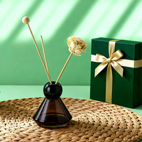 Bouteilles de diffuseur d'aromathérapie rondes personnalisées de 100 millilitres pour la décoration de la maison ; Bouteilles de diffuseur en verre parfumé de 4 onces