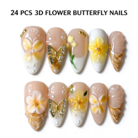 Vente en gros de faux ongles en amande avec fleurs 3D de luxe, papillon doré, perles, pour femmes, manucure