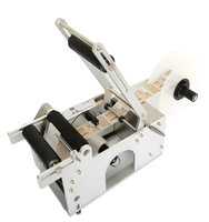 Étiqueteuse de bouteilles rondes semi-automatique