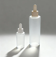 Flacon en verre ambré rond de 50 ml/100 ml avec pipette, opaque, givré, imprimé avec le logo YOGO, pour les gouttes pour les yeux