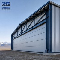 Hangar préfabriqué en structure métallique pour haute altitude, bâtiment métallique avec armature renforcée et cadre d'ancrage coupe-vent