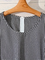 Robe sans manches à carreaux noirs et blancs pour femmes, nouvelle robe midi en polyester à volants et appliques florales, coupe trapèze