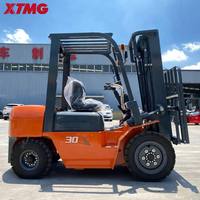Chariot élévateur diesel XTMG 3T avec capacité de montée de 20 % et transmission mécanique hydraulique pour chargement sur rampes raides