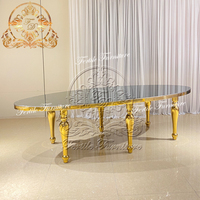 Nouveau modèle de table à manger de forme ovale en verre avec cadre en acier inoxydable et miroir pour événement de mariage ensemble de chaises