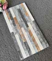 Vente en gros 300x600mm Carreaux de revêtement extérieur modernes Aspect pierre Extérieur 3D grossièrement brique pour la maison Prix bon marché Résistance au feu