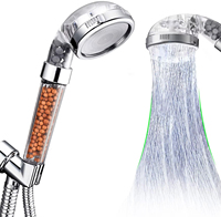Pommeau de douche de massage à filtre en pierre minérale ABS pommeau de douche filtré à débit d'eau à haute pression avec vaporisateur à main
