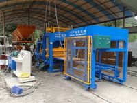 Machine à briques Chine Machine à fabriquer des briques Bloc de béton Chine Machine à fabriquer des blocs automatiques à ponte d'œufs Prix