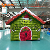 Tente gonflable géante commerciale Ceyu en forme de maison de Noël avec porte zippée et bordure de toit enneigée pour la décoration du Nouvel An