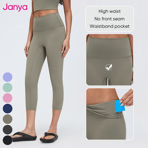 Janya Legging Capri de Sport et Yoga Respirant à Taille Haute Élastique, Sans Couture Avant, Coupe Ample, avec Poche - Product Image 1