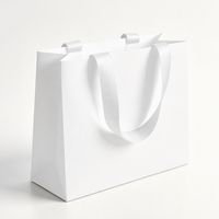 Sacs en papier écologiques réutilisables de luxe faits à la main avec logo imprimé personnalisé et impression dorée à chaud pour chaussettes, chaussures en fourrure et vêtements