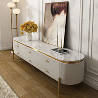 Ensemble de meuble TV et table basse de luxe moderne avec plateau en marbre et pieds en acier inoxydable doré pour salon d'appartement