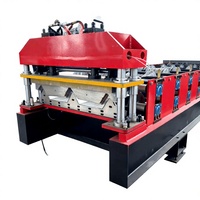 Machine de formage de rouleaux de toiture à double couche de Chine, machine de formage de rouleaux de toiture métallique à faible coût pour structure en acier