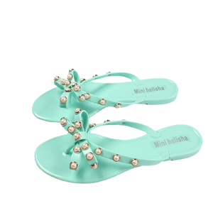 Mini sandales plates vert menthe Helisha avec décoration de nœud en perles, tongs tendance d'été pour femmes - Product Image 1