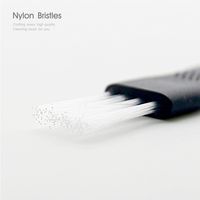 Nouveauté 2026 : Brosse de nettoyage et grattoir 2-en-1 noir et blanc, multifonctionnel pour cuisine, gadget de cuisine, 10 couleurs