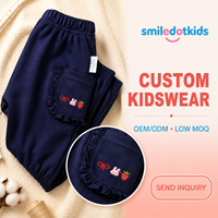 Smiledotkids Pantalon de jogging personnalisé pour enfants, bleu marine, poche à volants, nœud rouge, doux, OEM ODM, pour petites filles, vente en gros