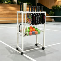 Chariot de rangement mobile en métal pour équipement sportif, idéal pour l'affichage des raquettes de tennis et de pickleball, avec roues, modèle Trykid, pour terrains de sport et clubs.