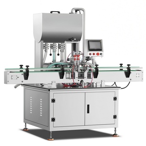 Machine de remplissage automatique industrielle pour jus de fruits frais et nectars en conserve et en contenants PET - Product Image 1