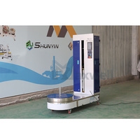 Machine d'emballage de bagages d'aéroport avec système de film pré-étiré haute efficacité