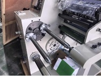 Machine de découpe et de rembobinage de rouleaux géants en petits rouleaux pour papier adhésif, étiquettes, PE/PP/papier/film à grande vitesse