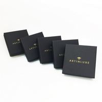 Xiamen Factory Custom nero cartone di carta gioielli bracciale confezione regalo rigida con foglio d'oro stampato Logo goffrato inserto in schiuma
