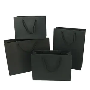 Magasin de chaussures personnalisées Sacs en papier imprimés Sacs en papier de luxe en carton noir mat Sacs en papier à provisions avec votre propre logo.