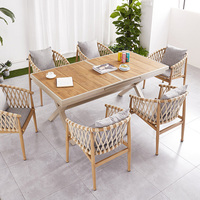 Table de salle à manger extensible moderne haut de gamme avec cadre en aluminium, imperméable et résistant au soleil, et ensemble de chaises pour jardin et terrasse extérieure