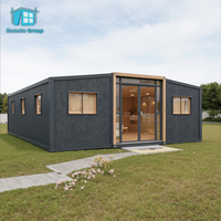 Maison conteneur multifonctionnelle intégrée, extensible, de luxe, 40 pieds, avec panneaux solaires, design élégant, salon