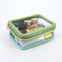 Sac de maquillage de voyage en PVC transparent de haute qualité, en cuir PU Saffiano, forme ovale, étui à cosmétiques transparent avec style tendance