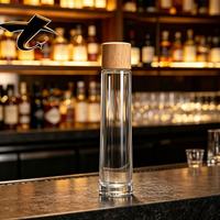 Bouteille en verre transparente pratique pour spiritueux, facile à remplir et à stocker pour diverses boissons alcoolisées et non alcoolisées