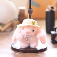 Mignon mini porte-clés et breloque de sac en peluche lapin doux et moelleux, avec pendentif cœur en perles, style machine à griffes