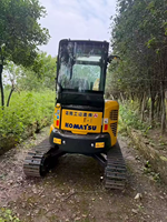 Mini-excavatrice sur chenilles Komatsu PC35 3T d'occasion avec moteur et système hydraulique fiables, idéale pour la construction urbaine et l'aménagement paysager