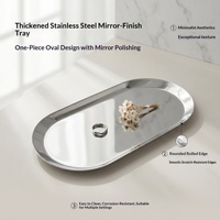 Plateau de toilette minimaliste finition miroir en acier inoxydable épaissi, plateau à parfum ovale monobloc pour la décoration de coiffeuse moderne