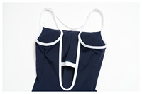 Combinaison de sport respirante pour femme, style color block, dos évidé, idéale pour le yoga et l'entraînement en extérieur – Nouvelle collection très prisée