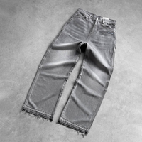 Fabricant OEM Jeans pour hommes en denim, coupe droite et large, délavé vintage, ourlet effiloché, style décontracté
