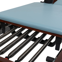 Ensemble de Pilates Wavar New Color Professional de haute qualité, en bois, pour usage commercial, avec sangles réglables et ressorts de résistance.