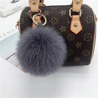 Pompon en fourrure de renard, breloque de sac, accessoire de bagage, porte-clés en peluche, embellissement de vêtement tendance, élégant pour les trajets quotidiens