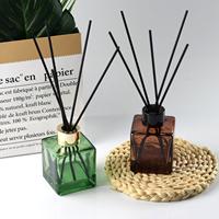 Couleur personnalisée 50 ml 100 ml 150 ml 200 ml Diffuseur de roseau vide carré ambré Bouteille en verre Diffuseur d'arôme noir Bouteille
