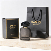Flacon de parfum vide 50 ml, texture cuir craquelé, verre gris foncé avec bouchon noir poli, livraison directe d'usine