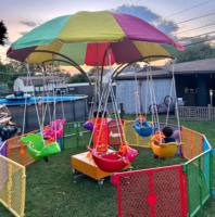 Manège portable à bascule pour enfants avec musique, idéal pour les parcs d'attractions - Offre spéciale