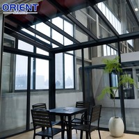 Véranda préfabriquée en aluminium à rupture de pont thermique toutes saisons avec toit rétractable motorisé et verre feuilleté résistant aux chocs