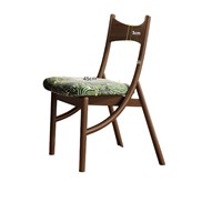 Chaise de salle à manger moderne avec coussin texturé et structure noire stable pour la maison et les restaurants