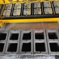 Machine de fabrication de blocs de béton mobile Machine de fabrication de blocs de ponte d'œufs de style mobile QMJ-6A Machine de ponte de blocs sans palette