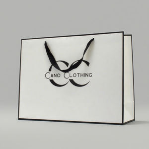 Sacs d'emballage de boutique imprimés de logo personnalisé Sac en papier à provisions de cadeau en carton blanc brillant pour bijoux de luxe vêtement avec poignée - Product Image 5